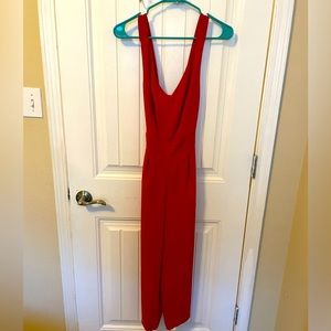 Red pantsuit with adjustable straps. Size 2.